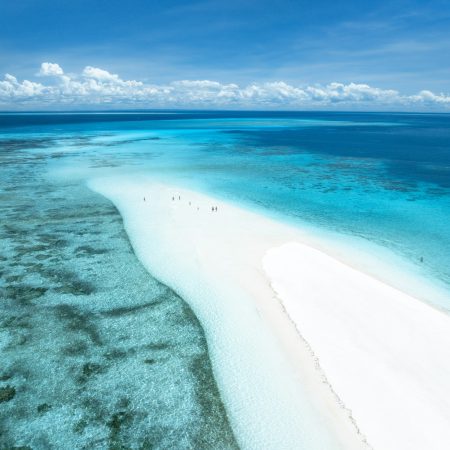 Aerial view of island, sandbank in ocean, sandy beach, blue sea